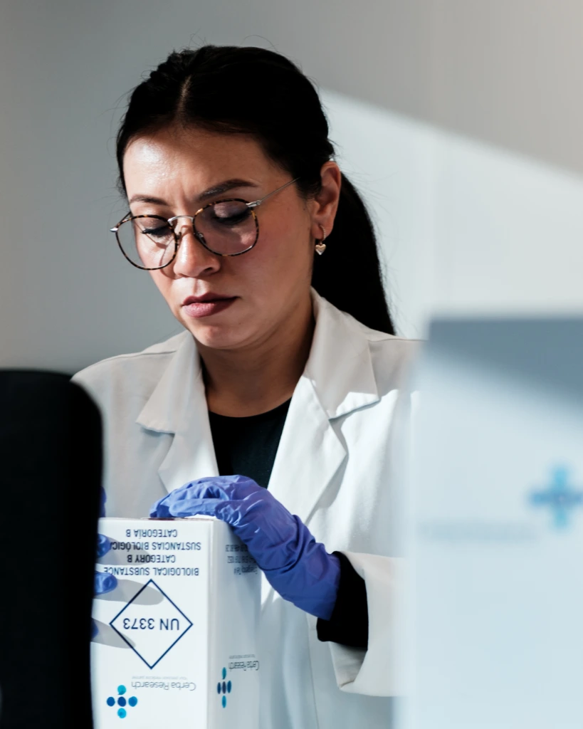 Female scientist sample packing line A