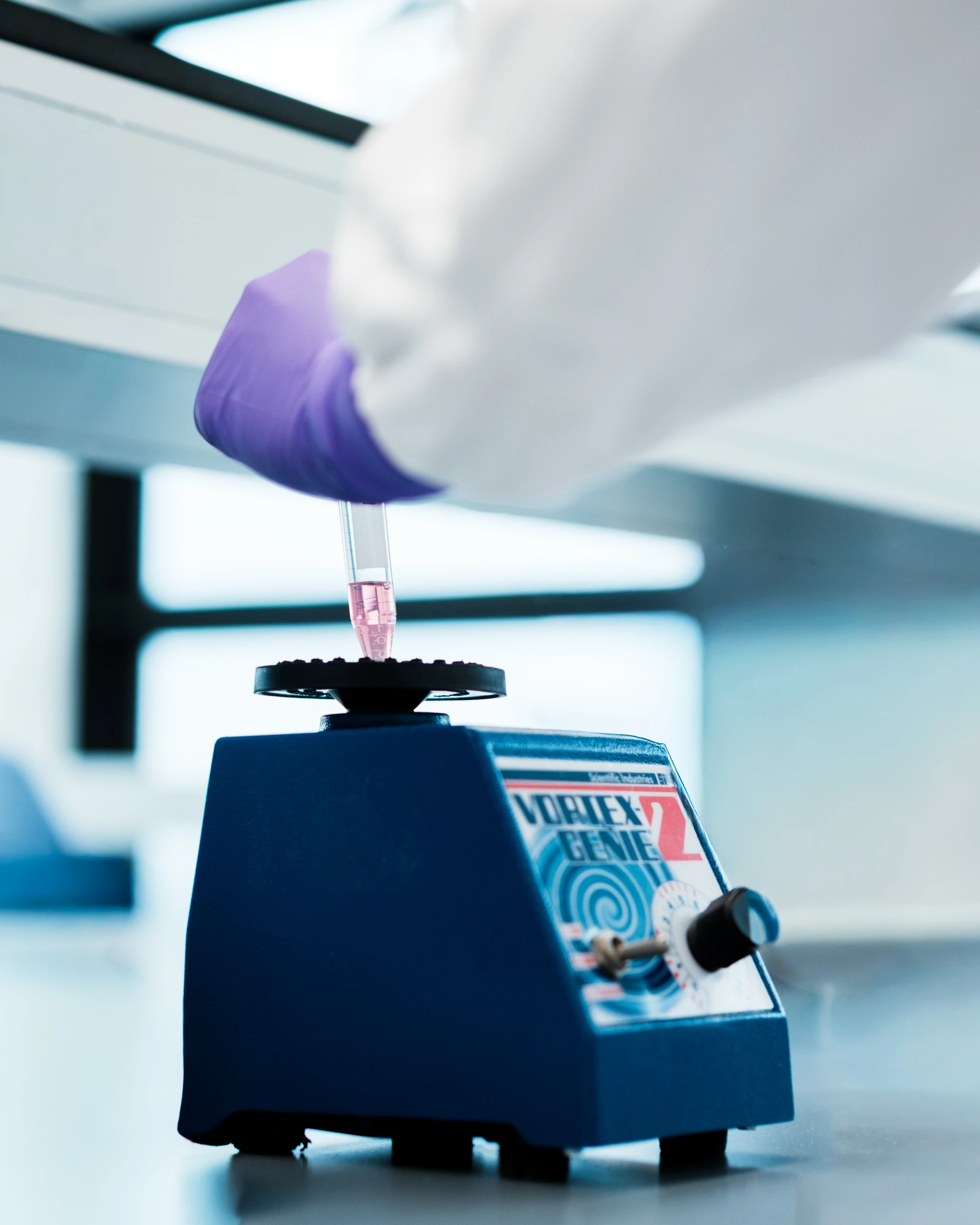 Close up of laboratory mixer with biological sample tube