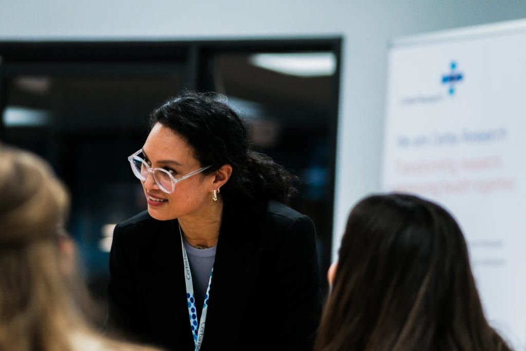 Scientist leading collaborative laboratory discussion